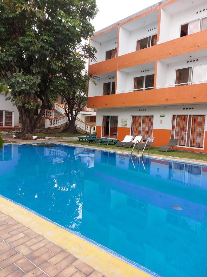 Palmas Hotel เควนาวากา ภายนอก รูปภาพ